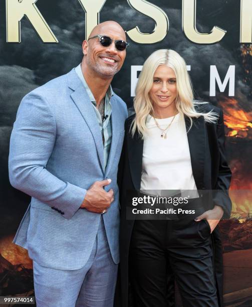 Dwayne Johnson and Lauren Wasser attend the premiere of Skyscraper at AMC Loews Lincoln Center.