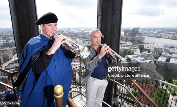 The Michel Tower trumpet players Josef Thoene and Horst Huhn stand at the main church St. Michaelis in Hamburg, Germany, 28 July 2017. The two...