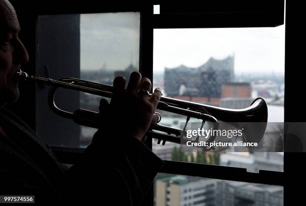 The Michel Tower trumpet players Josef Thoene and Horst Huhn stand at the main church St. Michaelis in Hamburg, Germany, 28 July 2017. The two...