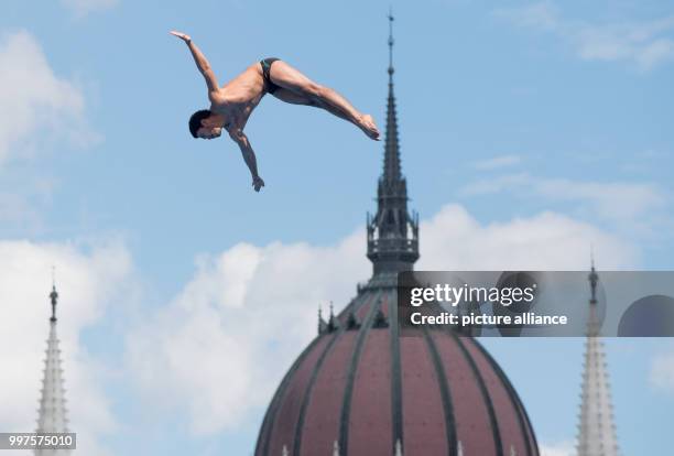 Miguel Garcia from Colombia in action during the preliminary round of the men's 27m cliff jumping competition in Budapest, Hungary, 28 July 2017....