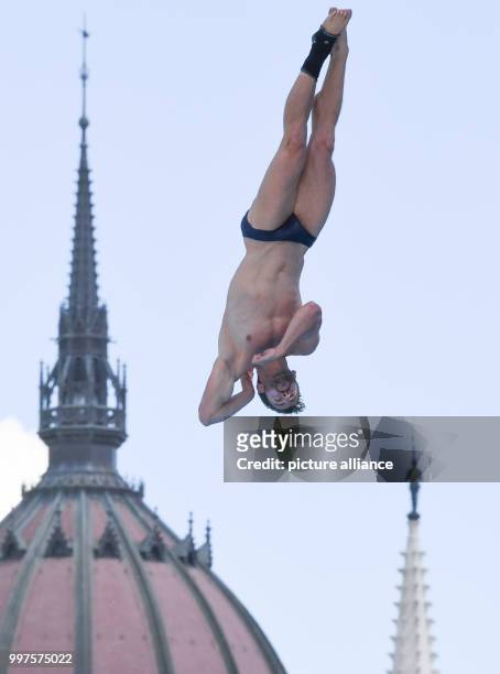 David Colturi from the US in action during the preliminary round of the men's 27m cliff jumping competition in Budapest, Hungary, 28 July 2017....