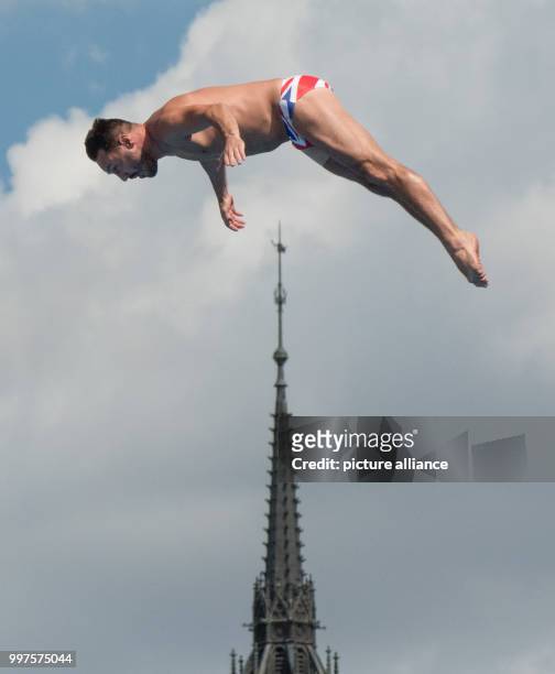 Blake Aldridge from the US in action during the preliminary round of the men's 27m cliff jumping competition in Budapest, Hungary, 28 July 2017....