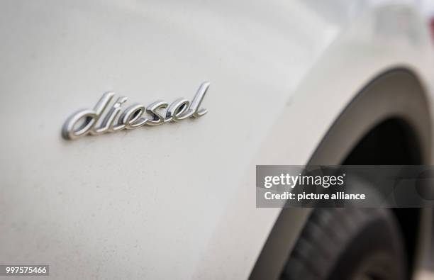 The word 'diesel' can be seen on a Porsche Cayenne 3.0 Liter Diesel, photographed in Stuttgart-Zuffenhausen, Germany, 28 July 2017. German Minister...