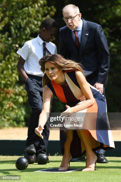 First Lady, Melania Trump, tries her hand at bowls as she meets British Army veterans, known as Chelsea Pensioners, at Royal Hospital Chelsea on July...