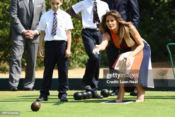 First Lady, Melania Trump, tries her hand at bowls as she meets British Army veterans, known as Chelsea Pensioners, at Royal Hospital Chelsea on July...