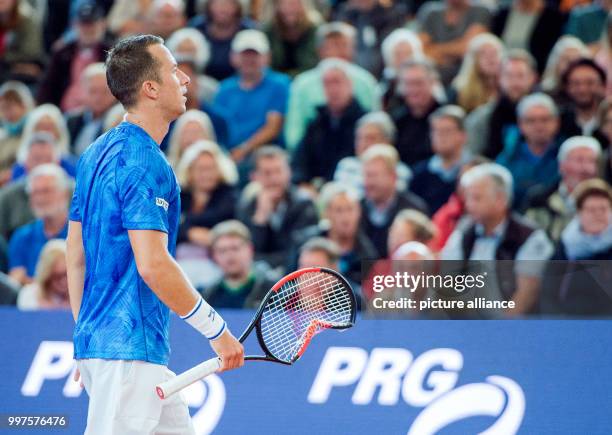 Philipp Kohlschreiber from Germany in action against Kicker from Argentina in the men's singles at the Tennis ATP-Tour German Open in Hamburg,...