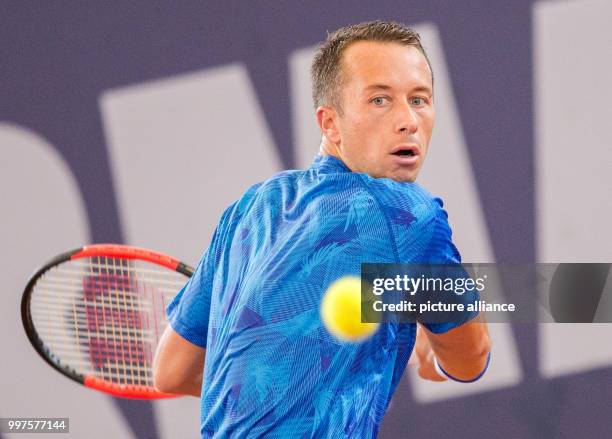 Philipp Kohlschreiber from Germany in action against Kicker from Argentina in the men's singles at the Tennis ATP-Tour German Open in Hamburg,...