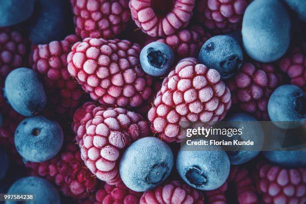 frozen berries - kunde stock pictures, royalty-free photos & images