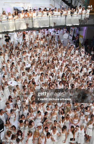 Women in wedding dresses participate in a world record attempt titled 'Nacht der 1001. Braut' in Pforzheim, Germany, 28 July 2017. At least 909 women...