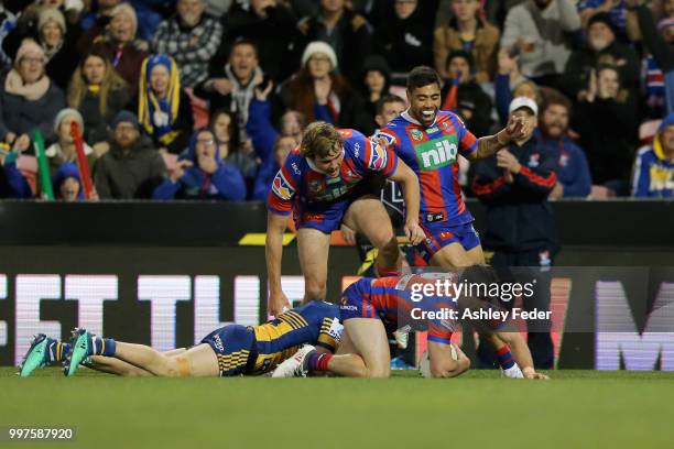 Connor Watson of the Knights scores a try during the round 18 NRL match between the Newcastle Knights and the Parramatta Eels at McDonald Jones...