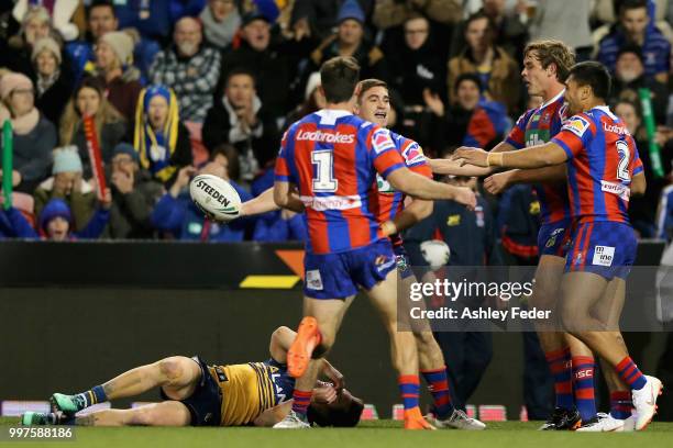 Connor Watson of the Knights celebrates his try during the round 18 NRL match between the Newcastle Knights and the Parramatta Eels at McDonald Jones...