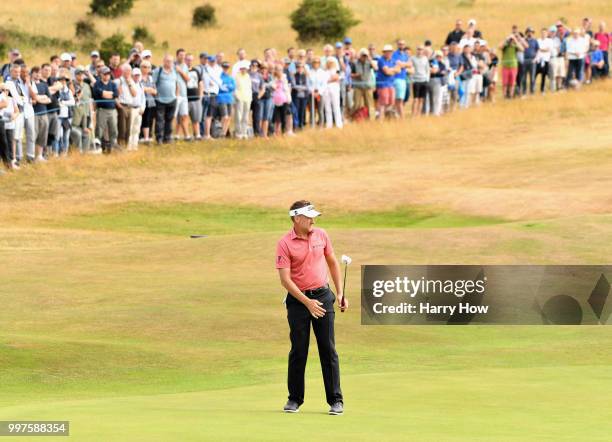 Ian Poulter of England reacts to a missed birdie putt on hole six during day two of the Aberdeen Standard Investments Scottish Open at Gullane Golf...