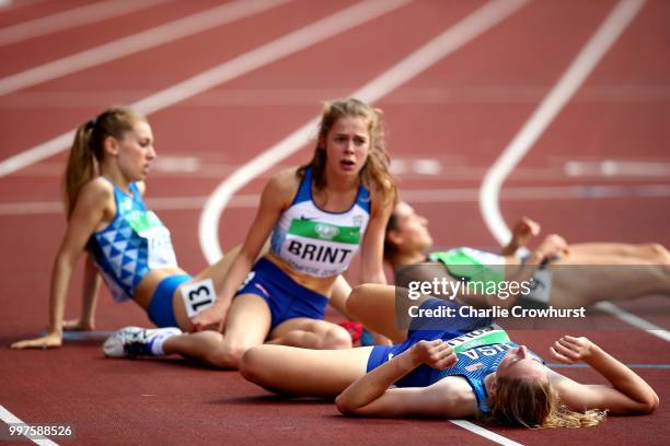 Caitlyn Collier of USA and Francesca Print of Great Britain look exhausted after crossing the line in the second heat of the women 1500m on day four...