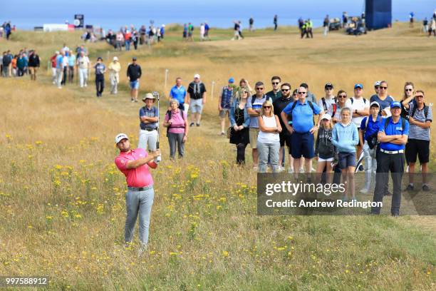 Tyrrell Hatton of England takes his second shot on hole nine during day two of the Aberdeen Standard Investments Scottish Open at Gullane Golf Course...