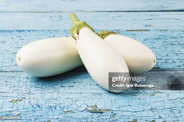 harvest: white eggplant on the old table - white eggplant stock pictures, royalty-free photos & images