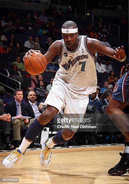 Andray Blatche of the Washington Wizards drives the ball against the Charlotte Bobcats during the game on March 23, 2010 at the Verizon Center in...