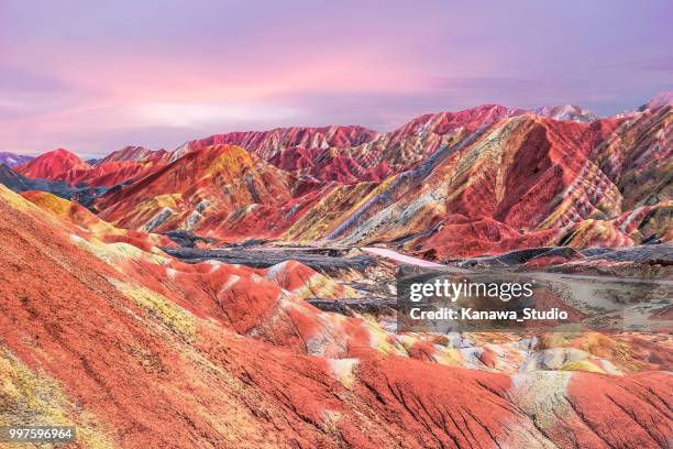 sunset in china's rainbow mountain - rainbow mountains china stock pictures, royalty-free photos & images