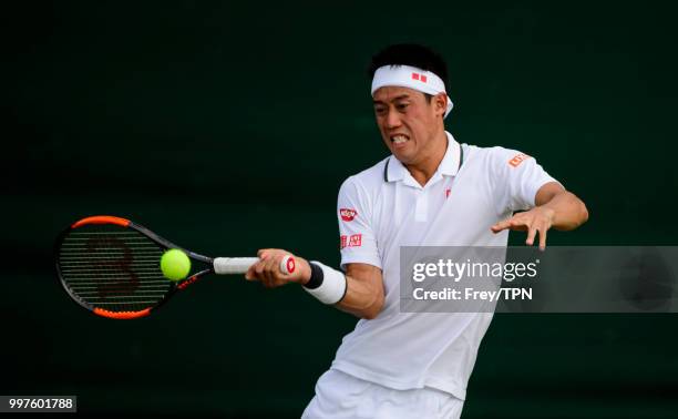 Kei Nishikori of Japan in action against Ernests Gulbis of Latvia in the fourth round of the gentlemen's singles at the All England Lawn Tennis and...
