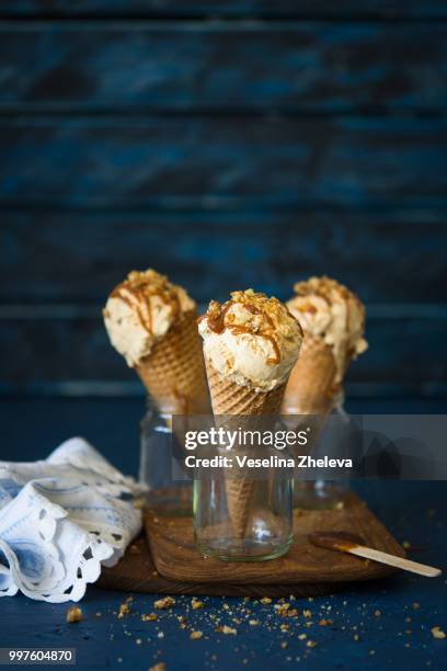 dulce de leche ice cream cones in jars. - leche stock pictures, royalty-free photos & images