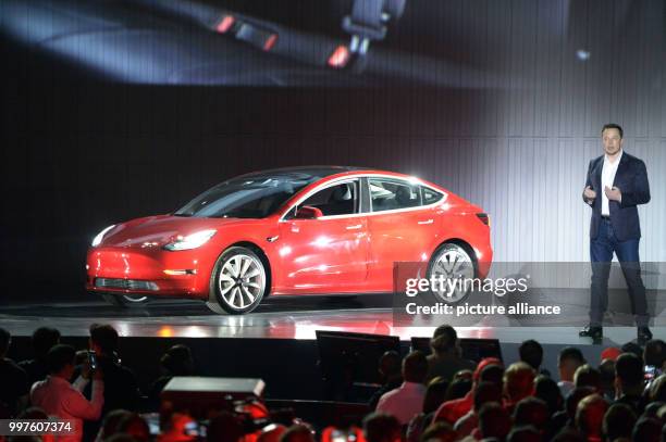 Tesla-CEO Elon Musk speaks during the delivery of the first more reasonable Tesla vehicle Model 3 in Fremont, US, 28 July 2017. Tesla plans on making...