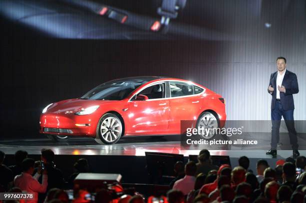 Dpatop - Tesla-CEO Elon Musk speaks during the delivery of the first more reasonable Tesla vehicle Model 3 in Fremont, US, 28 July 2017. Tesla plans...