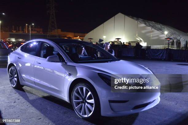 Car of the more reasonable Tesla vehicle Model 3 can be seen on the company grounds in Fremont, US, 28 July 2017. Tesla plans on making the Model 3...