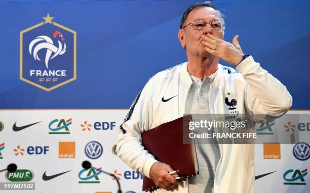 France's press offcier Philippe Tournon blows a kiss at the end of a press conference in Istra on July 13 two days before the Russia 2018 World Cup...