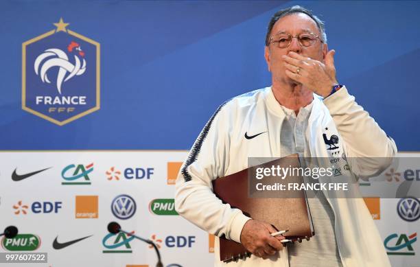 France's press offcier Philippe Tournon blows a kiss at the end of a press conference in Istra on July 13 two days before the Russia 2018 World Cup...