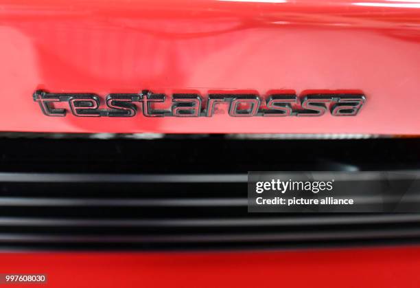 The lettering Testarossa seen on a Ferrari Testarossa from 1988 in the Auto & Technik Museum in Sinsheim, Germany, 29 July 2017. A toy manufacturer...