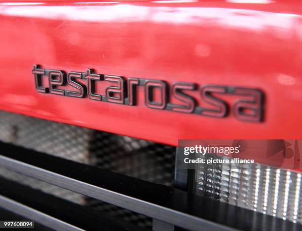 The lettering Testarossa seen on a Ferrari Testarossa from 1988 in the Auto & Technik Museum in Sinsheim, Germany, 29 July 2017. A toy manufacturer...
