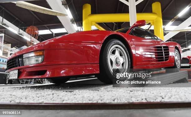 Ferrari Testarossa from 1988 seen in the Auto & Technik Museum in Sinsheim, Germany, 29 July 2017. A toy manufacturer is suing Ferrari over the...