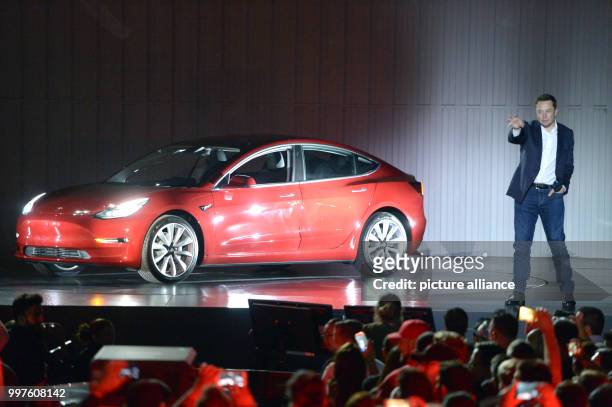 Tesla-CEO Elon Musk arrives at the delivery of the first more reasonable Tesla vehicle Model 3 in Fremont, US, 28 July 2017. Tesla plans on making...