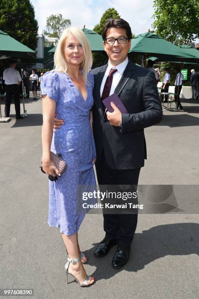 Michael McIntyre and his wife Kitty McIntyre attend day eleven of the Wimbledon Tennis Championships at the All England Lawn Tennis and Croquet Club...