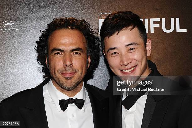 Director Alejandro Gonzalez Inarritu and Luo Jin attend the Biutiful Party at the Majestic Beach during the 63rd Annual Cannes Film Festival on May...