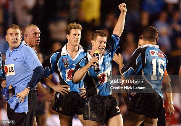 Adam Dykes of the Sharks celebrates after seeing a replay on the big screen during the NRL qualifying final between the Sharks and the Brisbane...