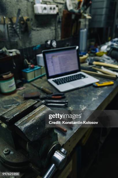 view of old tools,laptop and phone on table - spectacle case stock pictures, royalty-free photos & images