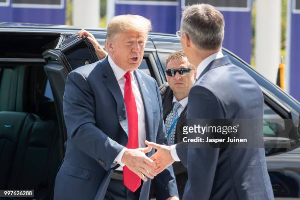 President Donald Trump is welcomed by NATO Secretary General Jens Stoltenberg at the 2018 NATO Summit at NATO headquarters on July 11, 2018 in...