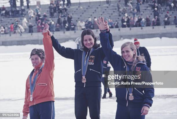 View of the medal winners of the Women's 1000 metres speed skating competition with, from left, silver medallist Atje Keulen-Deelstra of Netherlands,...
