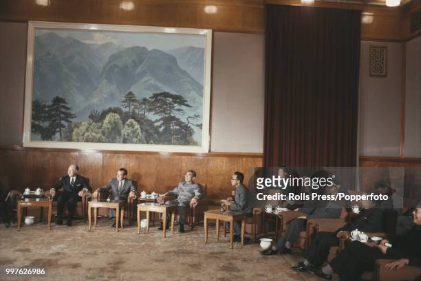 President of the United States, Richard Nixon pictured 2nd from left with Secretary of State William P Rogers as they meet for talks with Zhou Enlai...