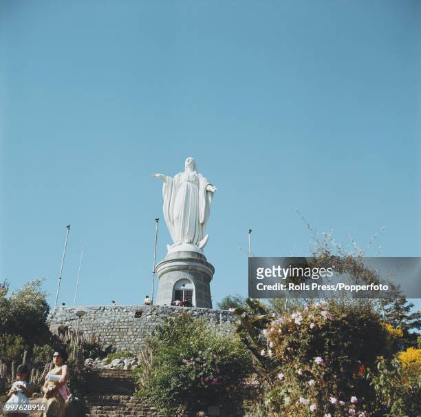 View of the statue of the Virgin Mary positioned on the top of San Cristobal Hill in Santiago, Chile circa 1970.
