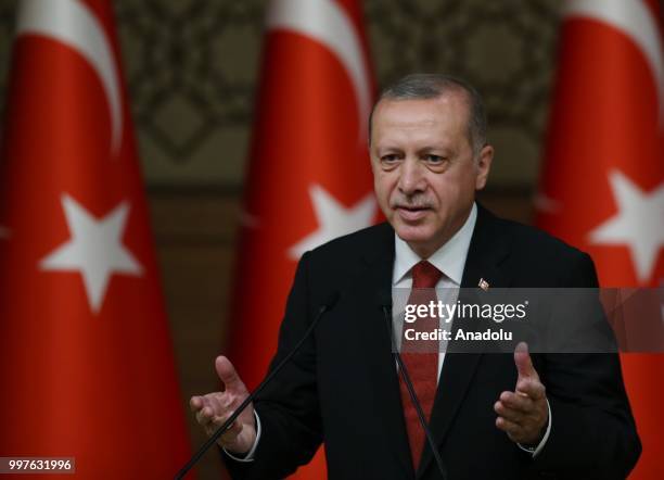 Turkish President Recep Tayyip Erdogan makes a speech as he attends the ceremony to present Turkish Grand National Assembly Speaker Binali Yildirim...