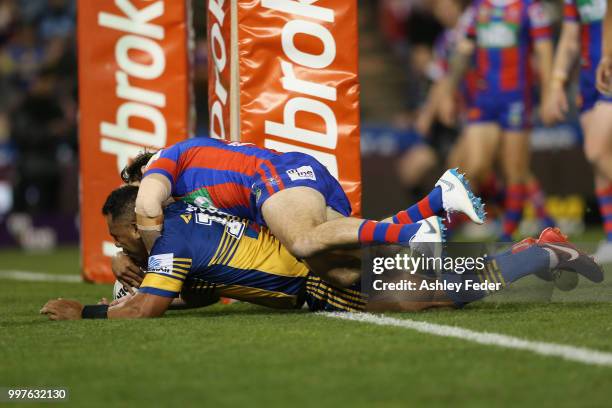 Siosaia Vave of the Eels scores a try during the round 18 NRL match between the Newcastle Knights and the Parramatta Eels at McDonald Jones Stadium...