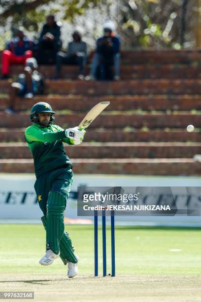 Pakistan's batsman Shoaib Malik plays a shot during the first one day international cricket match between Pakistan and Zimbabwe at Queens Sports Club...