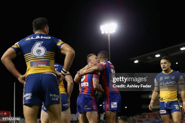 Shaun Kenny-Dowall of the Knights celebrates a try during the round 18 NRL match between the Newcastle Knights and the Parramatta Eels at McDonald...