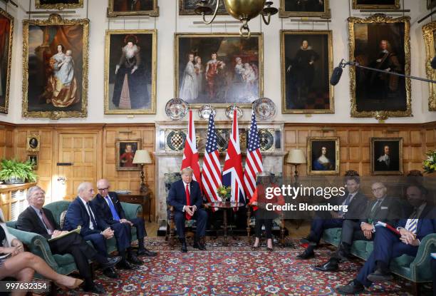 President Donald Trump, center left, Theresa May, U.K. Prime minister, center right, John Bolton, U.S. National security advisor, left, Woody...