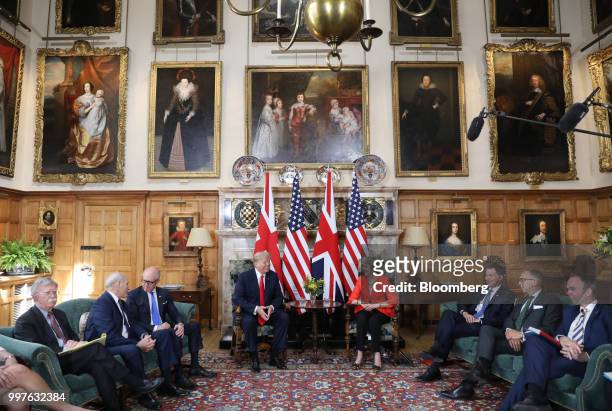 President Donald Trump, center left, Theresa May, U.K. Prime minister, center right, John Bolton, U.S. National security advisor, left, Woody...