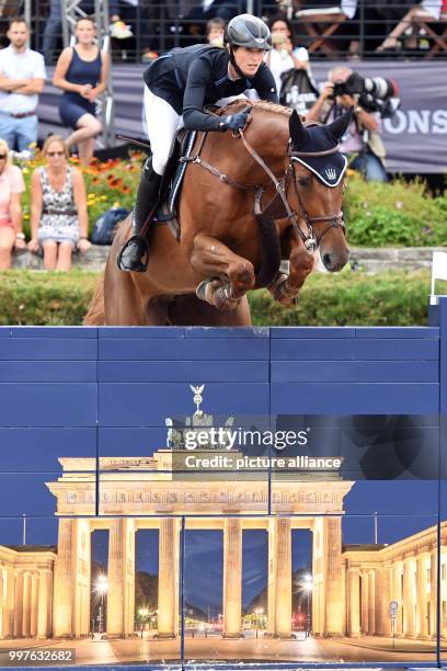Simone Blum on horse DSP Alice takes part in the qualification for the Grand Prix of Berlin during the jumping test at the Global Champions Tour,...