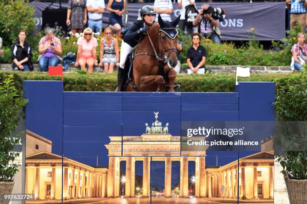 Simone Blum on horse DSP Alice takes part in the qualification for the Grand Prix of Berlin during the jumping test at the Global Champions Tour,...