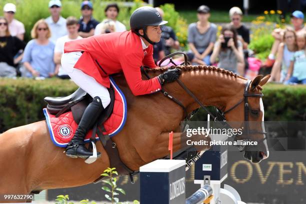 Kent Farrington on horse Creedence takes part in the qualification for the Grand Prix of Berlin during the jumping test at the Global Champions Tour,...