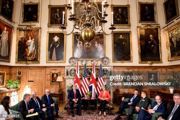 President Donald Trump and Britain's Prime Minister Theresa May prepare for a meeting at Chequers, the prime minister's country residence, near...